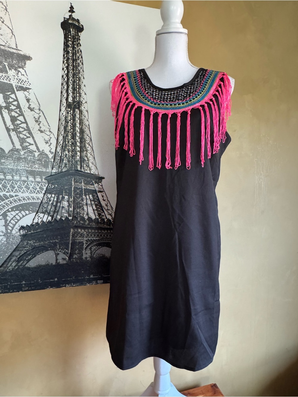 Lulumari Black Garment with Bright Red Brand Tag